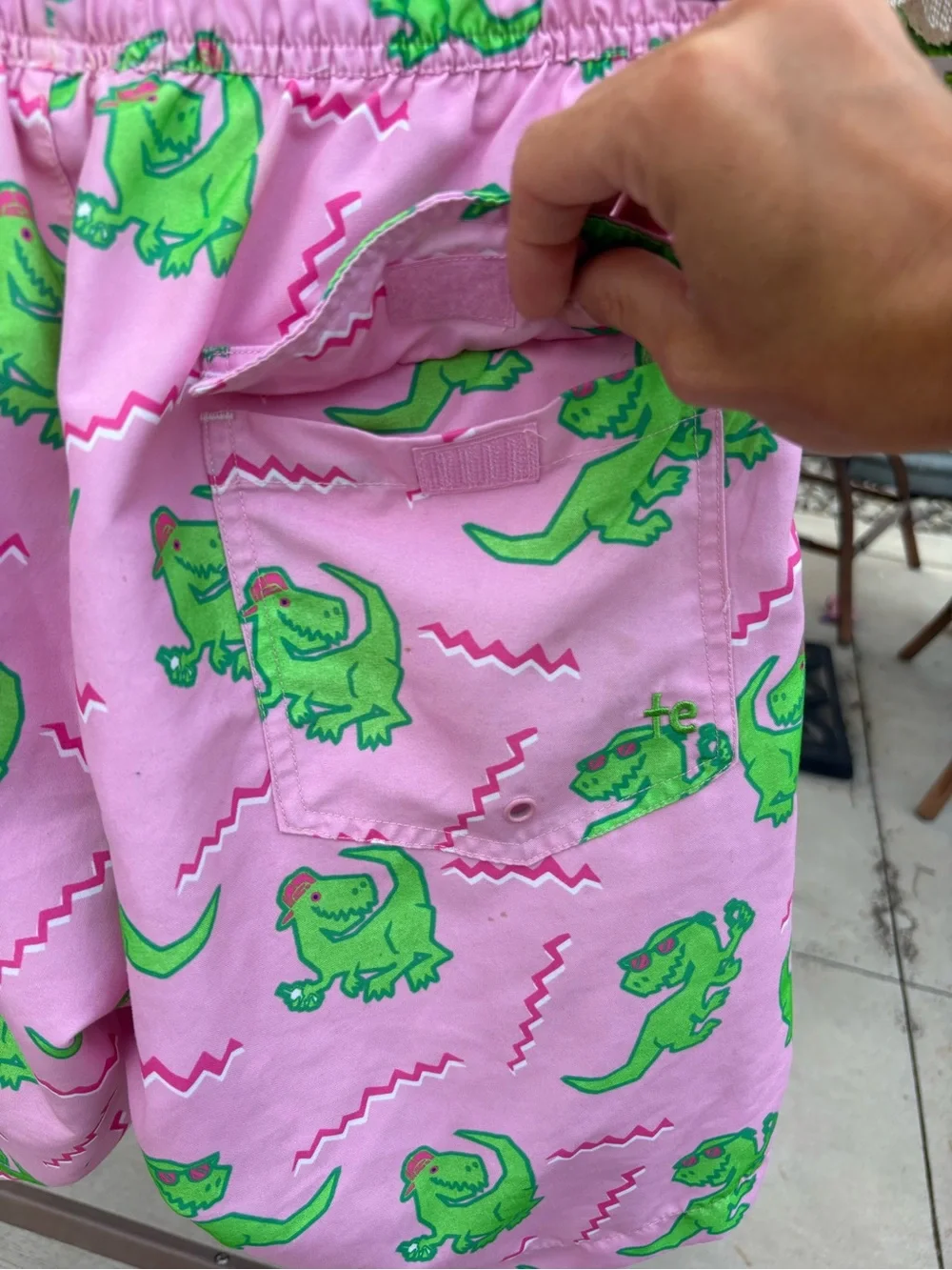 Tipsy Elves Men’s Pink Swim Shorts with Green Dinosaur Print- size M